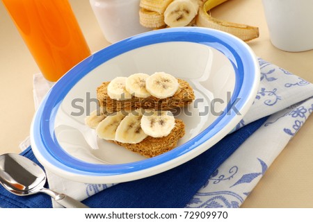 Iconic Australian breakfast cereal Weet Bix served with juice and banana.