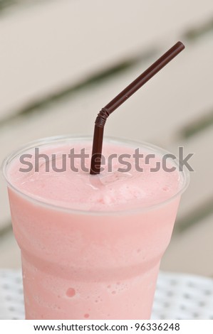 strawberries milk shake in the outdoor cafe