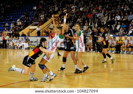 MINSK, BELARUS - MAY 30: Unidentified handball players (Germany(black) in attack during European Championship qualifying match (Belarus  Germany) on May 30, 2012 in Minsk, Belarus.