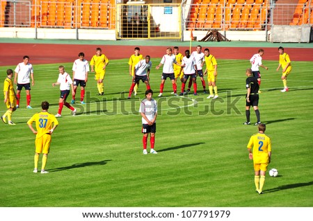 MINSK, BELARUS - JULY 1: Alexander Kobets (FC NAFTAN (#2) is preparing to break free kick during the match between FC NAFTAN and FC MINSK on July 1, 2012 in Minsk, Belarus