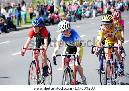 MINSK, BELARUS - MAY-19: Unidentified sportsmen compete in 15 km cycling race during NATIONAL DAY of SPORT on May 19, 2012 in Minsk, Belarus.