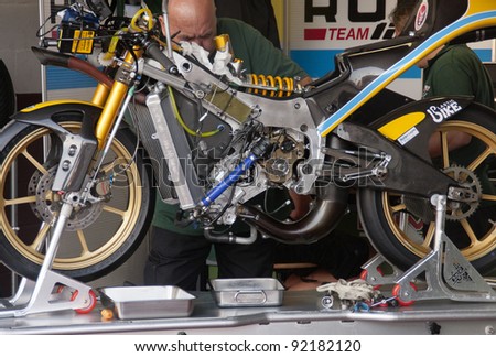 ALBACETE, SPAIN - OCT 8: motorcycle driven by Hiroki Ono for Rumi 125GP Team in the set up before the race at 2011 european championship of 125GP/Moto3 class, on October 8, 2011, in Albacete, Spain