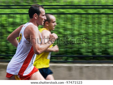 ALBACETE, SPAIN - MAY 10: A couple of unidentified marathon runners compete at the Albacete Half Marathon 2009, May 10, 2009 in Albacete, Spain