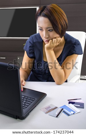 young woman frustrated because accounts are overdrawn