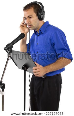 male voice over artist or singer on a microsphone wearing a blue shirt on a white background