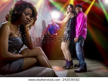 single black woman jealous of interracial couple on dancefloor