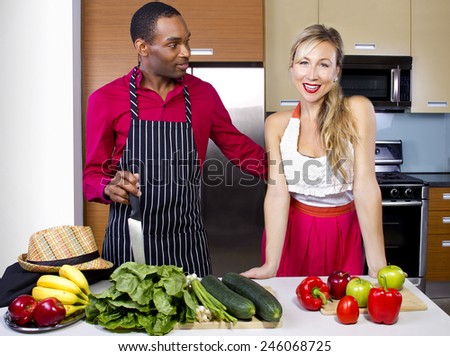 sweet helpful boyfriend cooking for girlfriend at home
