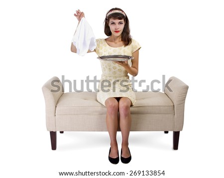 young female on a chaise lounge covering a surprise in a dessert tray.  the serving tray is empty for composites.