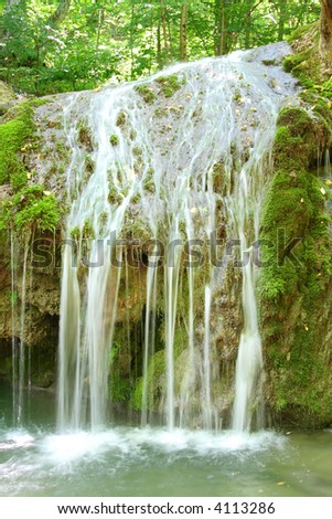 Mountain flow waterfall