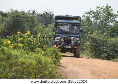 YALA, SRI LANKA - MARCH 25, 2015: Jeep with tourists on excursions to Yala national Park