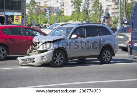 ST. PETERSBURG, RUSSIA - JUNE 08, 2015: Broken car stands in the middle of the carriageway