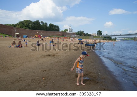 VELIKY NOVGOROD, RUSSIA - JULY 19, 2014: The city beach near the Kremlin walls
