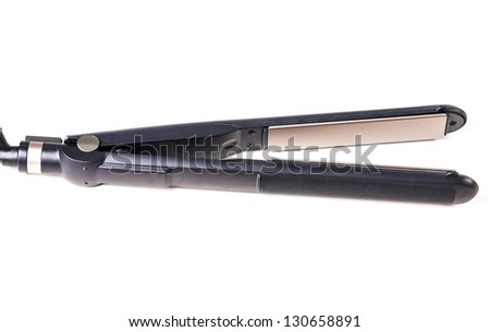 electric nippers for hair dressing are photographed on a white background