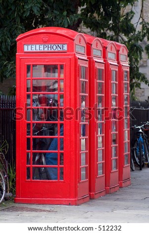 Typical British old-style red phone boxes