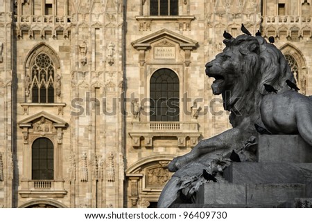 The lion in the piazza A sculpture at the cathedral square in Milan, Italy