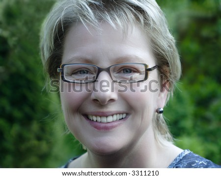 Blond woman with fashion eyeglasses Stock foto © 