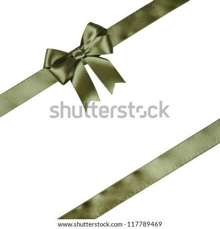 Green ribbon with bow isolated on white background.