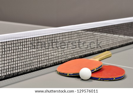 Equipment for table tennis - racket, ball, table closeup