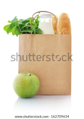 Brown paper bag with food isolated on a white background