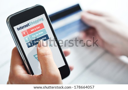 Female hands using smart phone for internet shopping