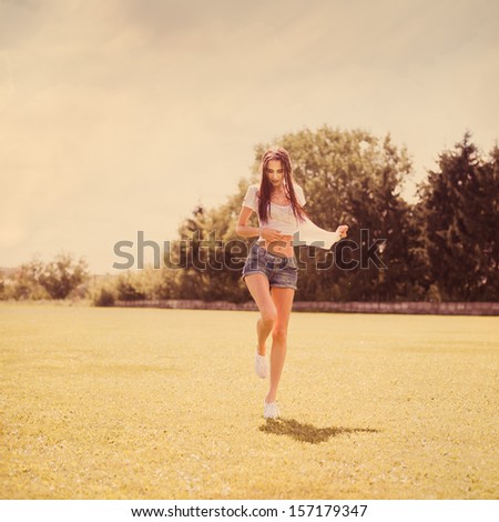 young beautiful girl in sports style