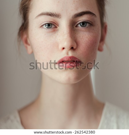 Similar – Image, Stock Photo Nude portrait of a young, blond, long-haired woman looking naked into the camera behind the window pane