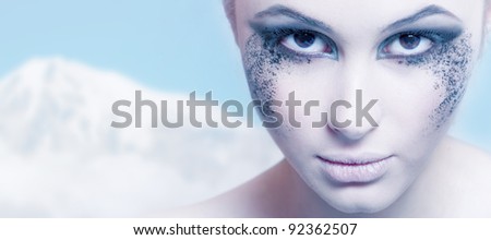 beautiful portrait of a girl. Creative winter makeup