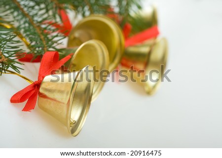 Christmas decoration - little golden bells and spruce