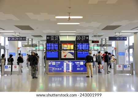OSAKA,JAPAN-NOVEMBER 12, 2014; Travelers at the gates at Kansai International Airport. This is the Osaka International Airport. November 12, 2014 Osaka, Japan