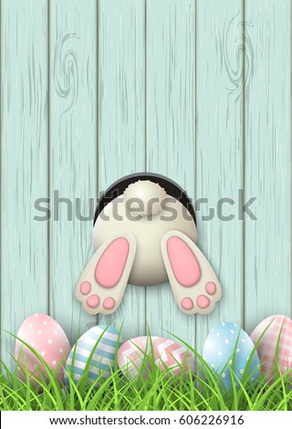 Easter motive, white bunny bottom and easter pink and blue eggs and fresh grass on blue wooden background, vector illustration, eps 10 with transparency and gradient meshes