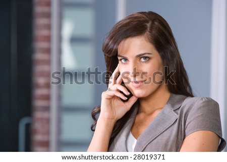 Business woman thinking in a modern office