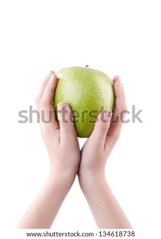 Boy hand with green apple isolated on white background