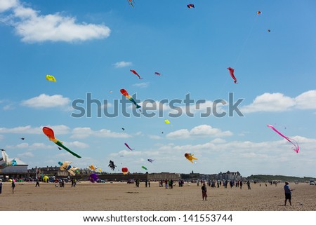 WESTON-SUPER-MARE, SOMERSET-JUNE 9:  Colourful kites attracted crowds at the first Weston Kite Festival on Sunday June 9, 2013 in Weston, Super Mare, Somerset.