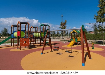 Similar – Foto Bild Schaukel auf Kinderspielplatz