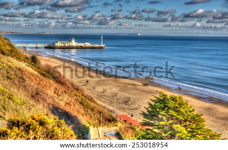 Bournemouth beach pier and coast Dorset England UK like a painting in vivid bright colour HDR