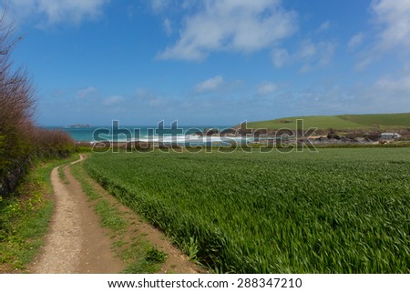 South West Coast Path Newtrain Bay coast North Cornwall near Padstow and Newquay in spring with blue sky and sea