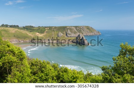 Three Cliffs Bay south coast the Gower Peninsula Swansea Wales uk in summer with blue sea and sky