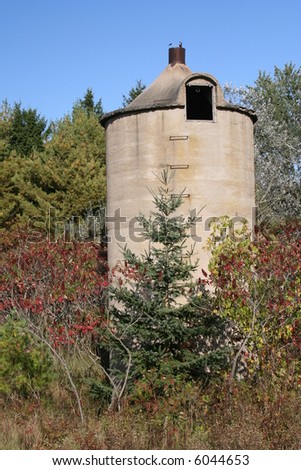 old concrete silo in fall