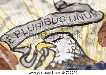 E Pluribus Unum included in the Seal of the United States, being one of the nation\'s mottos at the time of the seal\'s creation. Detail photo, shallow depth of view.