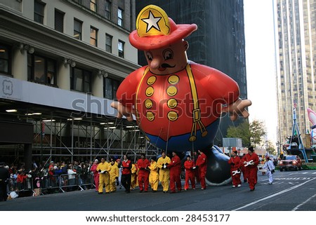 MANHATTAN - NOVEMBER 27 : Policeman cartoon character balloon at the Macy\'s Thanksgiving Day Parade November 27, 2007 in Manhattan. The first parade was held in 1924 in Newark, New Jersey.