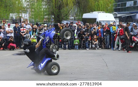 Moto free style pilot stunting on the square - Pyatigorsk, Russia, Opening of moto season 2015 on 1st May 2015