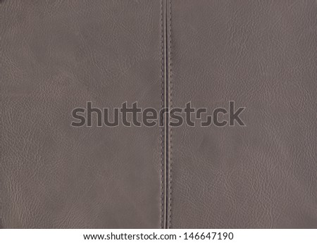 Old Leather Gray Background / Old gray used leather with center seam