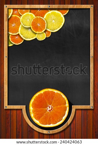 Blackboard with Wooden Frame and Fruit. Vertical blackboard with wooden frame, oranges and lemons. On wooden background