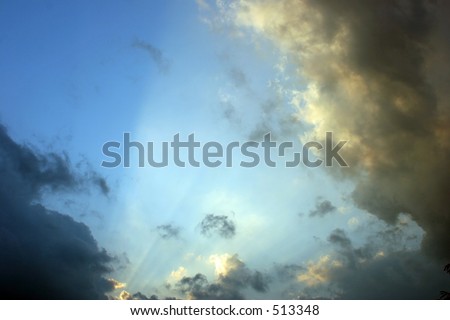 Sunburst lighting sky after a clearing storm