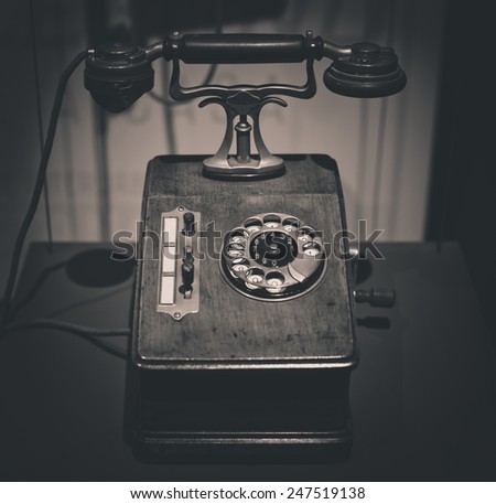 vintage old telephone black and white photo