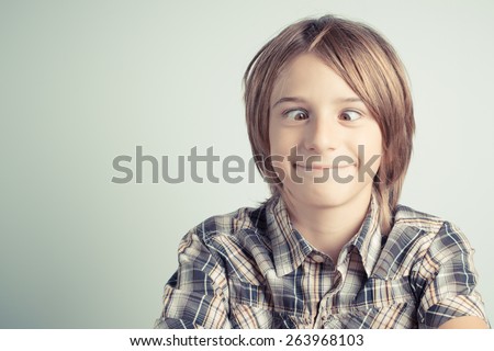 funny boy with cross-eyed - vintage style photo