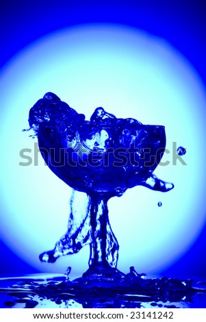 Close up view of margarita glass on blue back