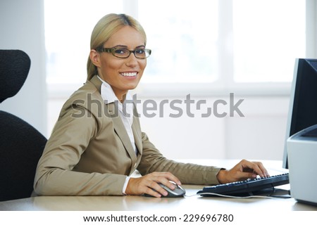 Businesswoman typing on the computer