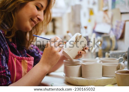 Similar – Image, Stock Photo Artisan woman working with torch on jewels