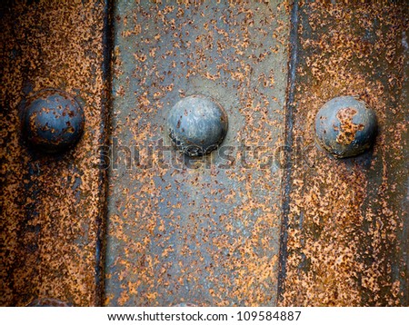 Rusty steel background texture on a plate steel railroad bridge